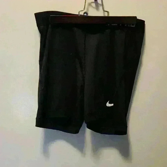 2 pair Nike pro shorts, dri-fit, womans medium, 1 pair gray the other black - Picture 3 of 4